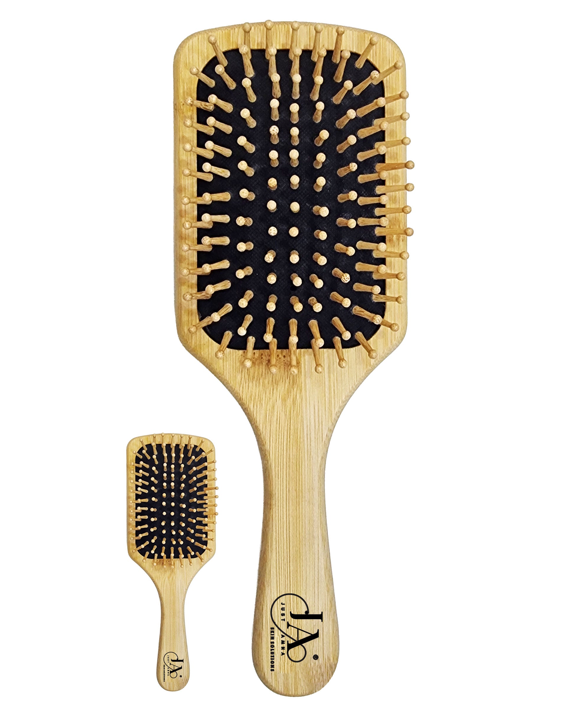 Wooden paddle brush with black bristles on a white background