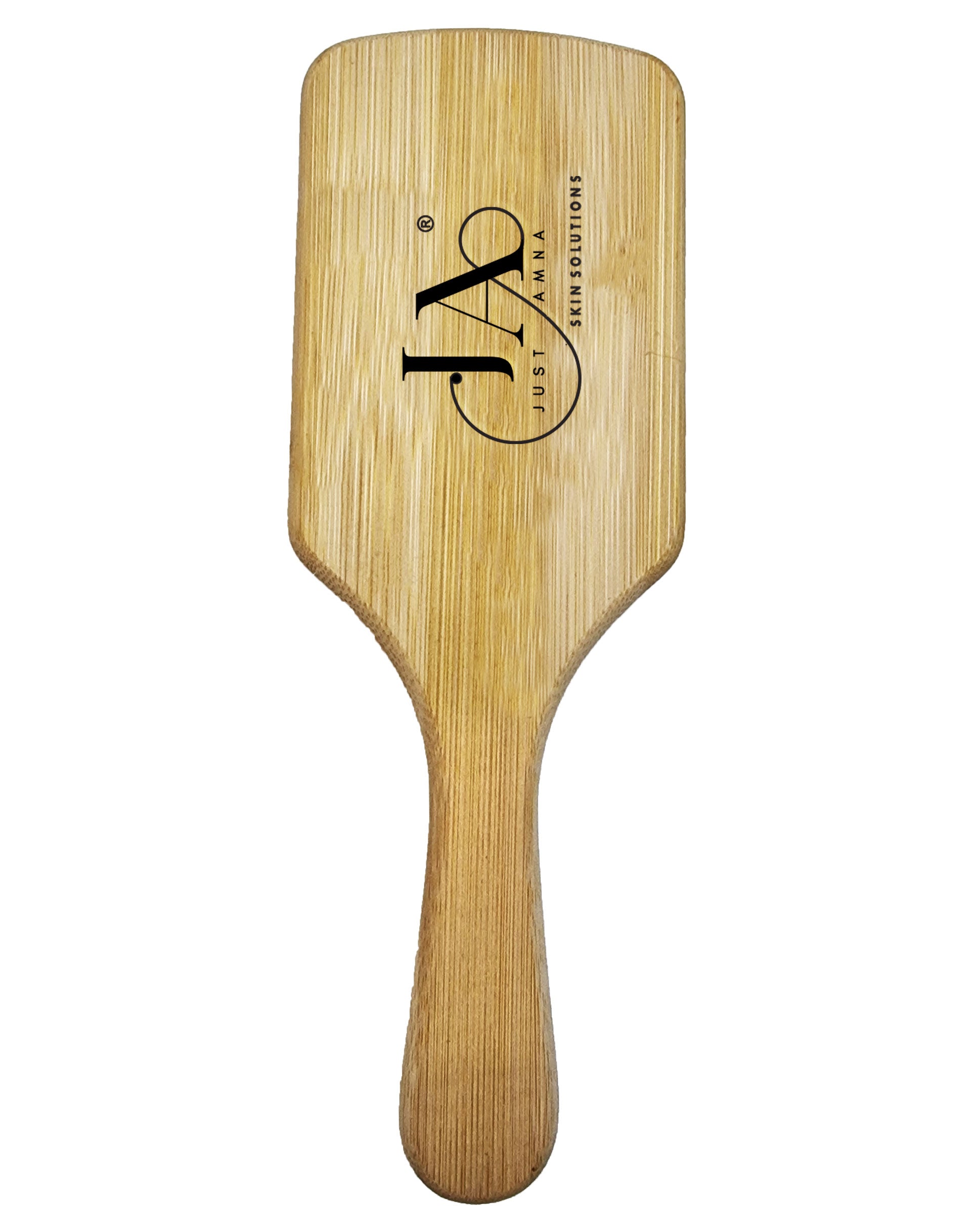 Wooden paddle with 'Just Amna' branding on a white background